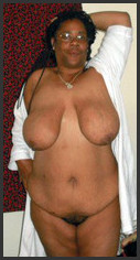Black Grandmother Boobs - Seventy black granny with big saggy tits.